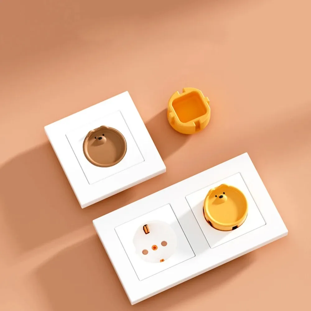 Outlet Cover Baby - ฝาครอบป้องกันเต้าเสียบไฟฟ้าสำหรับเด็ก 5 ชิ้น ลายการ์ตูนน่ารัก ซิลิโคนป้องกันไฟฟ้าช็อตและฝุ่น